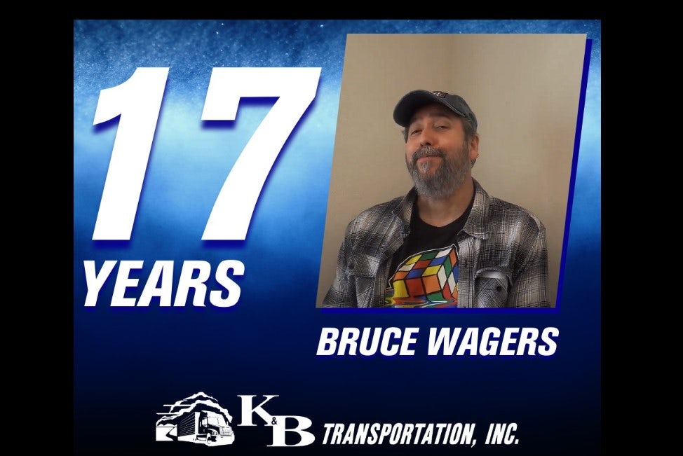 K&B Transportation celebrates with Bruce Wagers, for his 17 years of driving service image
